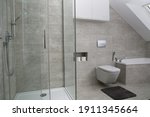 A modern bathroom in gray colors in a simple style 