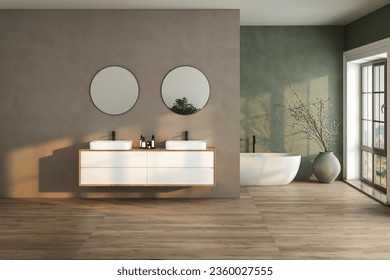 Modern bathroom interior with soil tone and green color walls, parquet floor, double sink, bathtub, plant. - Powered by Shutterstock