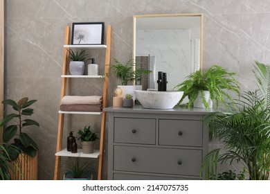 Modern bathroom interior with stylish vessel sink and beautiful green houseplants - Shutterstock ID 2147075735