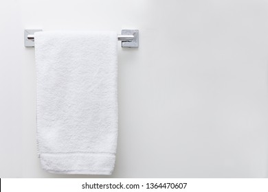 Modern Bathroom Towel Dryer Mockup On White Wall Background With Copy Space