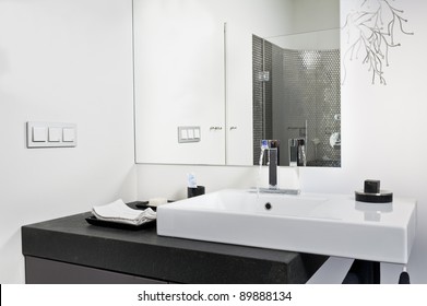 Modern Bathroom White Sink With Flowing Water
