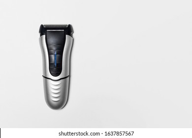 Modern battery Electric Shaver for man isolated on white background with clipping path.High resolution photo.Top view.Close-up. - Shutterstock ID 1637857567