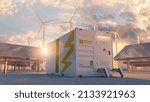 modern battery energy storage system with wind turbines and solar panel power plants in background at sunset