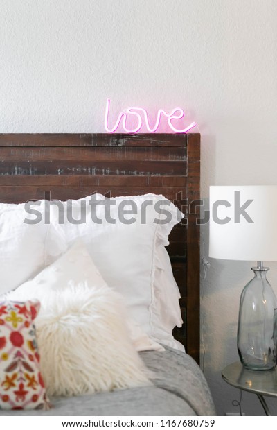 Modern Bed Decorative Pillows Neon Sign Stock Photo Edit