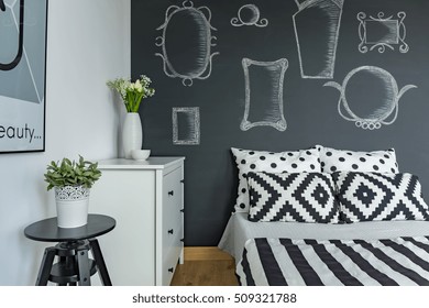 Modern Bedroom With Chalkboard Wall And Double Bed