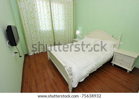 modern bedroom with a double bed.