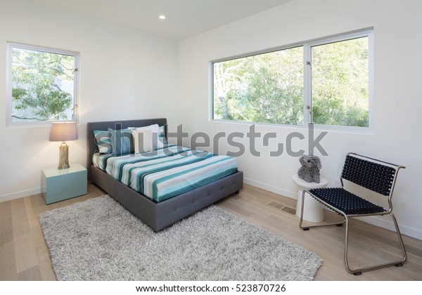 Modern Bedroom Fluffy Rug Wooden Floor Stock Image