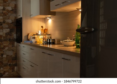 Modern And A Bit Messy Kitchen At Night