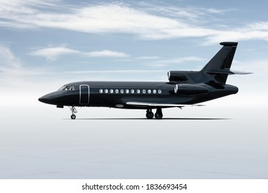 Modern black corporate business jet isolated on light background with sky