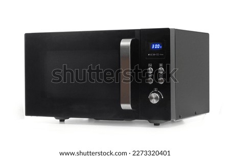 Modern black microwave oven isolated on white background