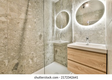 Modern Black Shower Column In Expensive Open Bathroom With Gray Tiled Wall And Window