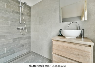 Modern Black Shower Column In Expensive Open Bathroom With Gray Tiled Wall And Window