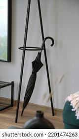 Modern Black Umbrella Holder With Black Umbrella Inside