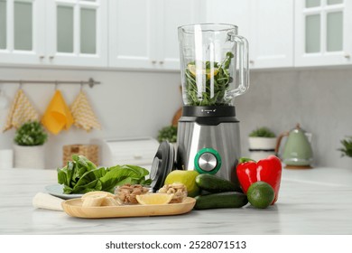 Modern blender with ingredients for smoothie on white marble table in kitchen - Powered by Shutterstock