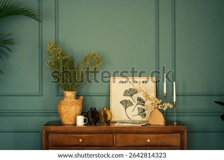 Modern Boho Interior with Styled Console Table and Green Paneled Wall