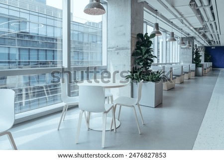 Group of young adults having business meeting in start up office