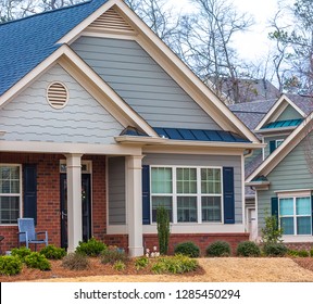 A Modern Brick And Siding Townhouse In A Small Retirement Community