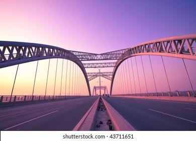 Modern Bridge On The Sunset Background Outdoor.