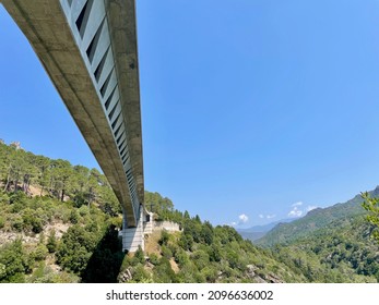 Modern Bridge Over Vecchio In Vivario, Corsica, France. Low Angle View.