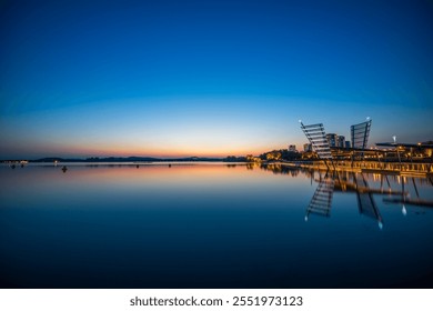 Modern Bridge Reflecting in Serene Sunset Lake - Powered by Shutterstock