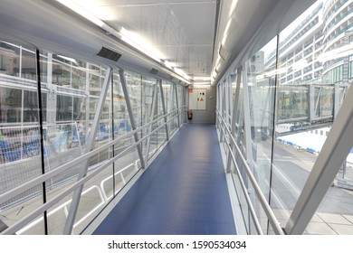 Modern And Bright Gangway At The Port Terminal To The Entrance Of A Cruise Ship