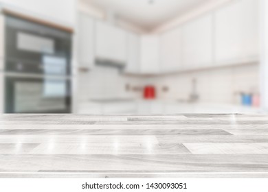 Modern bright kitchen with a white wooden countertop  - Shutterstock ID 1430093051
