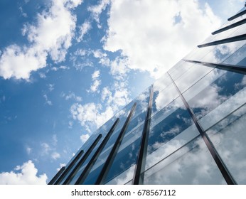 Modern Building Architecture With Blue Sky And Clouds