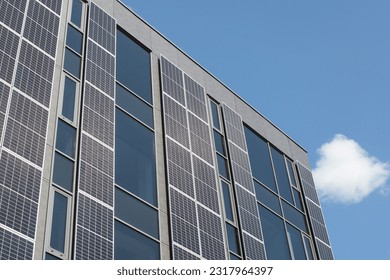 Modern building boasting a solar facade. Wall with solar panels on a modern building. - Shutterstock ID 2317964397
