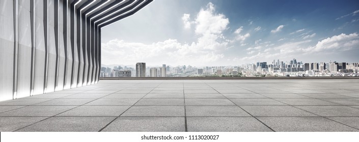 Modern Building And Empty Floor With Skyline