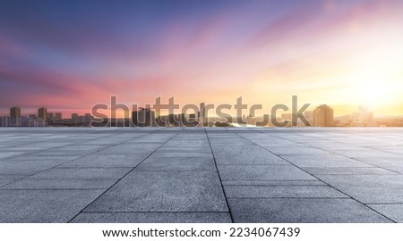 modern building and empty floor with skyline. Panoramic urban architecture, cityscape with space