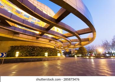 Modern Building Facade With Empty Cement Road For Copy Space.