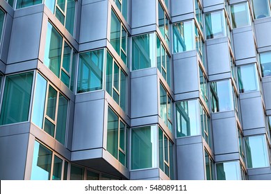 Modern building facade with window sections of aluminum, being tilted, getting an bay window feeling, in an apartment building in New York City