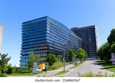 Modern building with glass facade at Triemli Hospital at City of Zürich on a sunny spring day. Photo taken May 18th, 2022, Zurich, Switzerland.