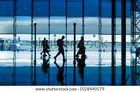 modern building and people silhouettes