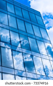 Modern Building With Reflection On Glass