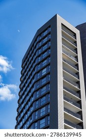 Modern Building With Reflective Windows. Structures Featuring Geometric Shapes And Shimmering Glass