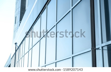 Modern building with tinted windows. Urban architecture