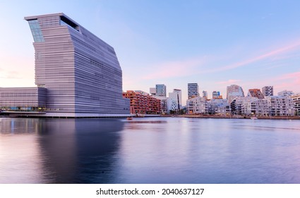 Modern buildings in Oslo, Norway, with their reflection in the water. These are some of the new buildings in the Bjorvika neighborhood. Travel and architecture concepts. Oslo - Barcode