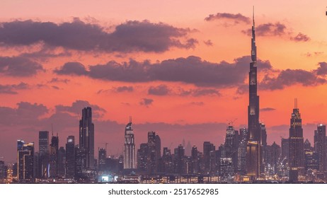 Modern buildings panorama in luxury downtown aerial timelapse of the city after sunset. From day to night transition in financial center Dubai, United Arab Emirates - Powered by Shutterstock