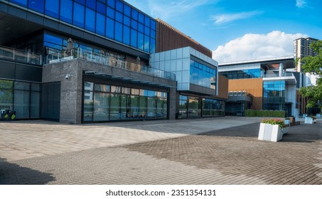 Modern business building in sunny day - Powered by Shutterstock