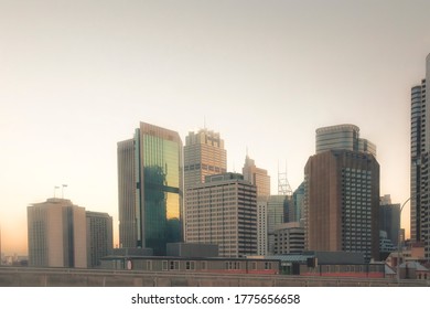 Modern Business Buildings In Sydney Financial District, Australia At Sunset.