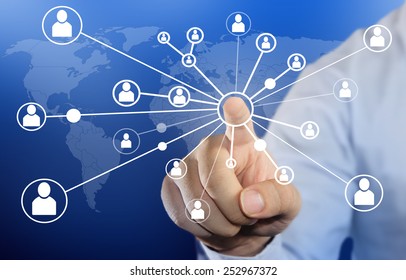 Modern Business Concept Image Of A Businessman Clicking People Connection Icon On Blue Background