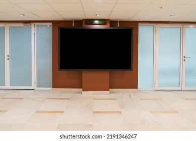 Modern Business Lobby Of A Hotel Or Office With A Large Information Screen