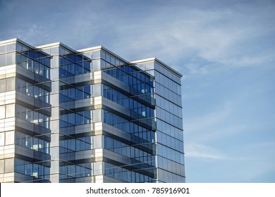 Modern business office made from glass against blue sky, Canada - Shutterstock ID 785916901