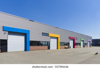 modern business units with colorful roller doors