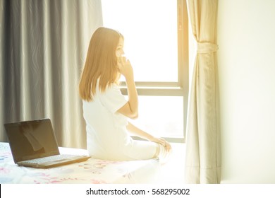 Modern business women with laptops and mobile  Communications in the morning - Shutterstock ID 568295002