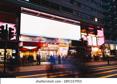 Modern Busy Street With Glowing Lights Empty Screen With Crowd Of People Crossing Road And Walking Along Sidewalk In Night City Of Kuala Lumpur