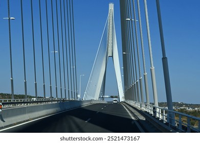 Modern cable bridge over the river in Portugal.
