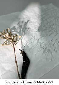 Modern Calligraphy.  Text In Cyrillic - Sonnet 47 By William Shakespeare.  Selective Focus Image.