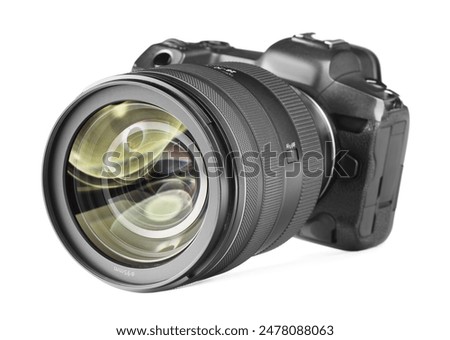 Modern camera isolated on white. Photographer's equipment